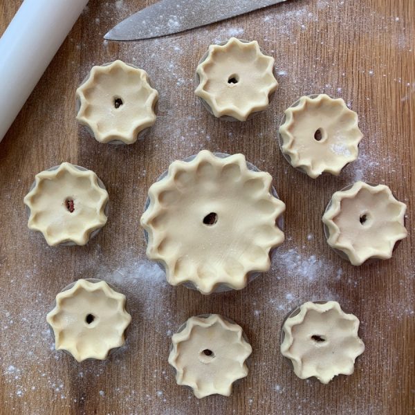 Gluten-free pork pies ready for the oven, made with our gluten-free hot water crust pastry mix